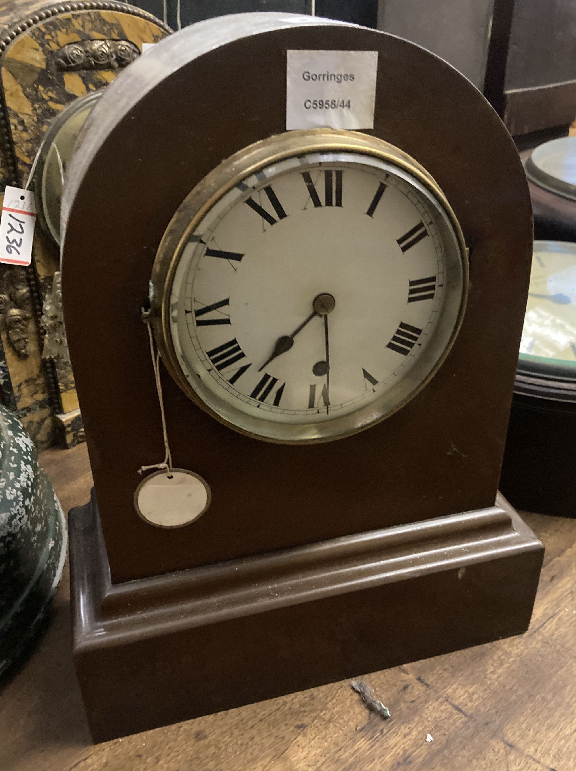 A mahogany mantel timepiece, height 38cm